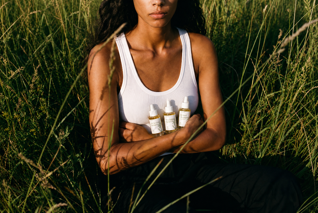 Founder of Phyto-Pure is holding her first products in her arms 